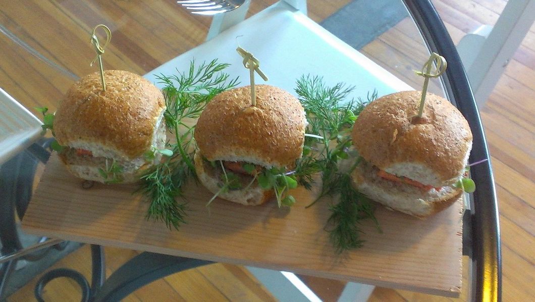 Sandwiches on a wooden board, prepared for a corporate lunch